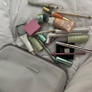 Skin store  Gray Travel Bag with Assorted Makeup